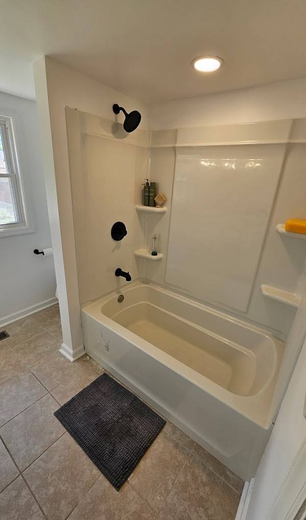 Bathroom and bathtub/shower after being renovated by Lexington Contracting