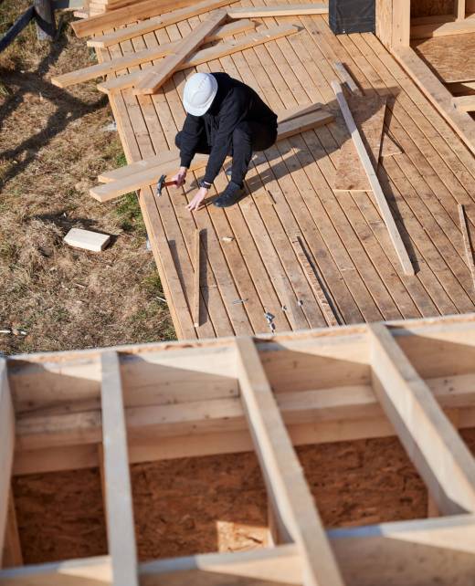 man-worker-hammering-while-building-wooden-frame-h-2023-11-27-05-31-14-utc-2