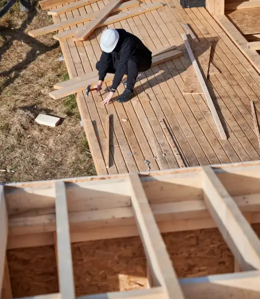 man-worker-hammering-while-building-wooden-frame-h-2023-11-27-05-31-14-utc